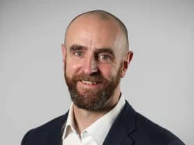 Mark H Durkan