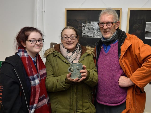 Kate Rafferty, with her ceramic exhibit, pictured with her daughter Nadine and tutor Tim Agnew at the recent Eden Place Arts Centre Student Christmas Exhibition. DER4718GS026