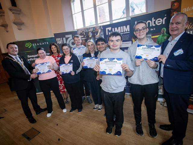 The young award winners from Ardnashee College pictured receiving their certificates from the Mayor, Ruairi McHugh, Joanne Sweeney and Paul Kirkpatrick. Included in photo is Leona Gillespie, MiM.