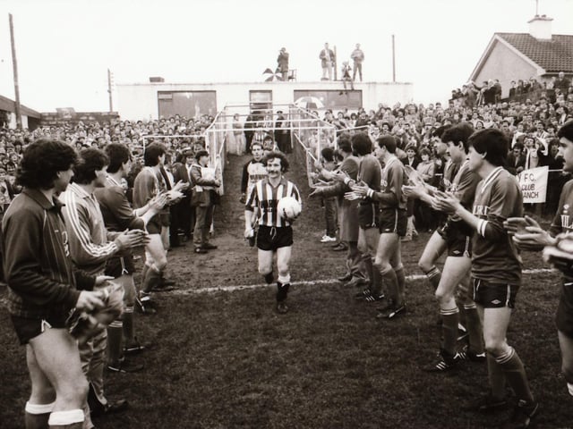 Players, club officials and staff and fans as Derry City FC face Finn Harps FC at Ballybofey in their first league meeting.