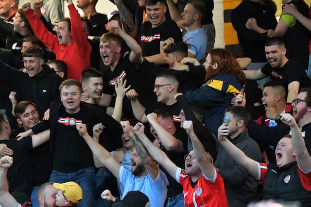 Fans celebrate Derry Cty’s Europa Conference League win against HB Torshavn, at the Brandywell, on Thursday evening. Photo: George Sweeney. DER2329GS – 53