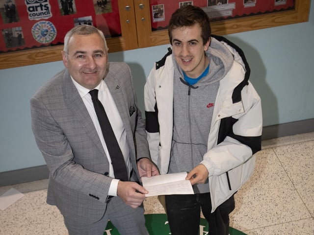 WELL DONE AARON!. . . .Mr. Gerry Beattie congratulating A Level student Aaron Sarkissian on his A* & 2As at St. Joseph's Boys School on Thursday morning. (Photos: Jim McCafferty Photography)