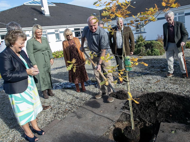 25 YEARS OF WHITE OAKS TREATMENT CENTRE. . . . . . Brendan Carlin pictured planting a tree to mark 25 years since the official opening of White Oaks Treatment Centre on Saturday afternoon last. Included are Marguerite Hamilton, Managing Director, Stephen McLaughlin, Clinical Director, Katrina McCallion, Marian Gallen, Stan McGowan, Tony Barron and Brendan Grant. (Photos: Jim McCafferty Photography)
