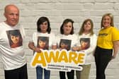 Sean McGlinchey, family, and Mary O’Kane AWARE NI Corporate Relationship Officer