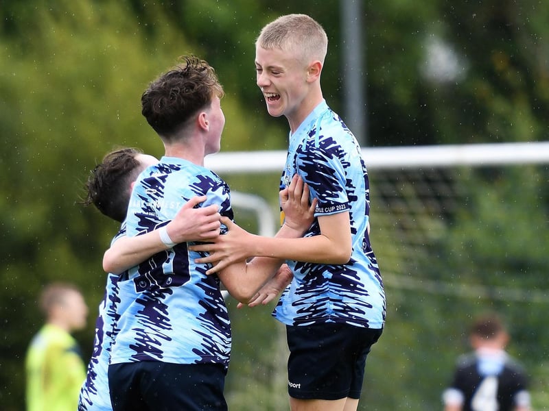 Magherafelt Sky Blues striker Fearghal McLarnon celebrates after scoring the opening goal of their O'Neill's Foyle Cup Under-13 final against Maiden City Academy.