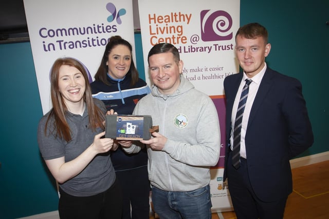 Julie White, OLT, pictured handing over a gift pack to Collie Kelly who took part in Saturday’s Men’s Health Day event at the Creggan Centre. Included is Aisling Hutton, Bogside, Brandywell Health Forum and Padraig Delargy, Sinn Fein.