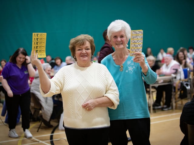 Up for a game of Christmas Bingo is Mary Harkin and Rita Campbell. : .