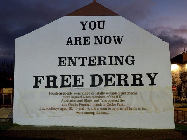 One of the projected images, on Free Derry Corner on Thursday evening, of the British colonial past from the ‘The Sun Never Set And The Blood Never Dries’ art project created by Art Everywhere. The event was part of Bloody Sunday 51 anniversary. Photo: George Sweeney. DER2305GS – 110