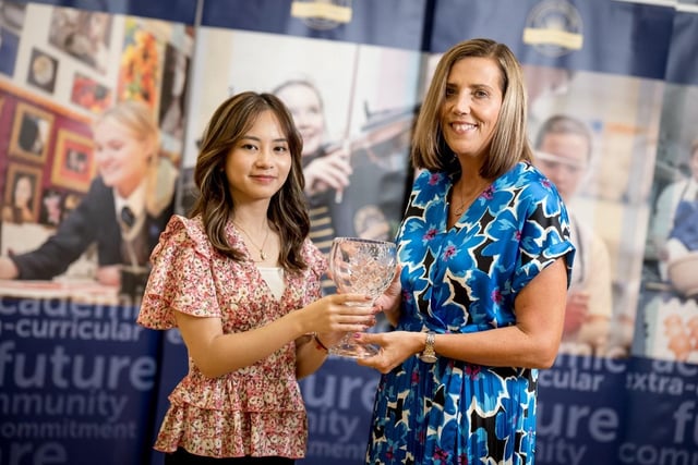Erica De Vera receives the O'Kelly Award for A2 Biology from Mrs Kathryn Butcher (Head of Biology).