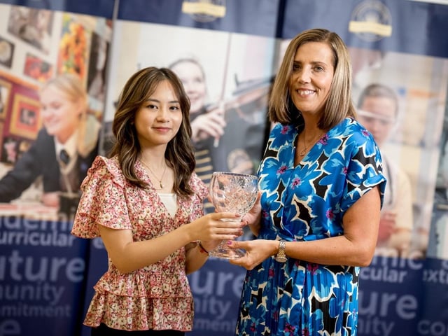 Erica De Vera receives the O'Kelly Award for A2 Biology from Mrs Kathryn Butcher (Head of Biology).