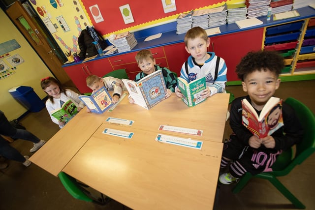 The boys and girls from Mrs McCaul’s class show their love for reading during World Book Day at Steelstown PS.