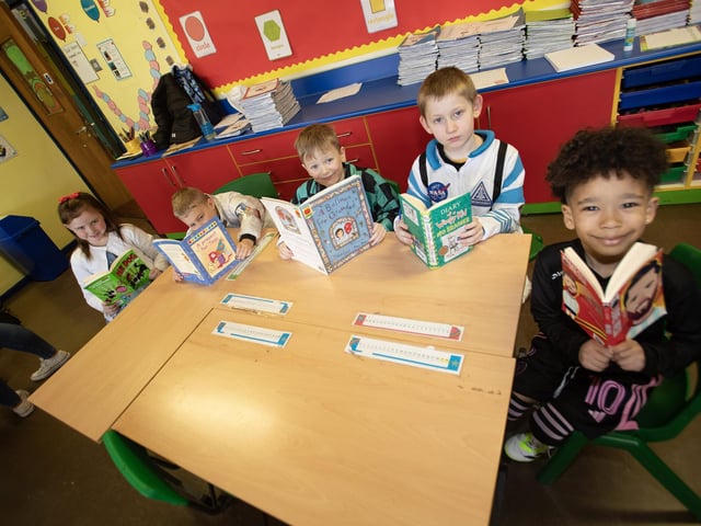 The boys and girls from Mrs McCaul’s class show their love for reading during World Book Day at Steelstown PS.