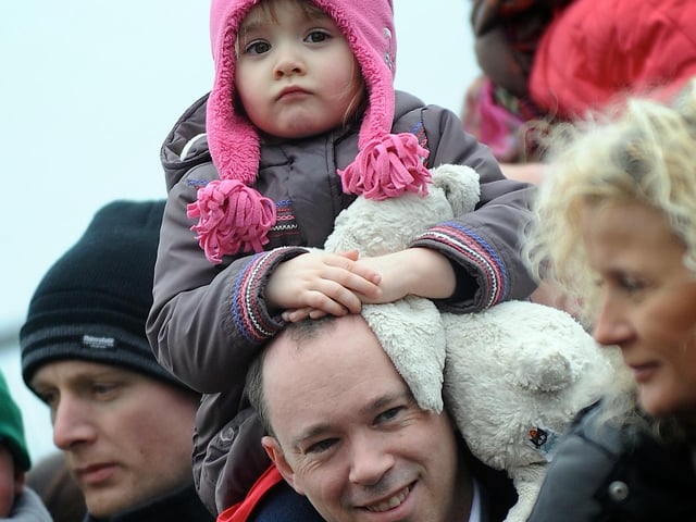 Chris Walsh and his daughter Charlotte take int he parade in Derry on Sunday. (1803SL67) Photo: Stephen Latimer