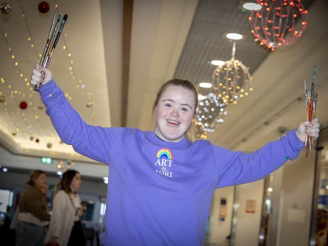 TORI IN RESIDENCE!. . . . .The affable Tori McNeill makes her way into the Lisnagelvin Shopping Centre on Wednesday, brushes in hand! (Photos: Jim McCafferty Photography)