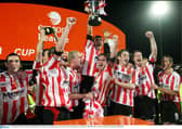 Derry City players celebrate after receiving the eircom league cup following victory over Shelbourne at Brandywell. Picture credit: Oliver McVeigh / SPORTSFILE