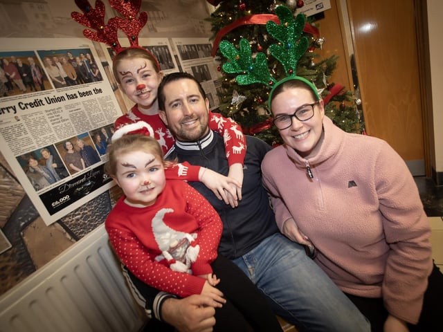One of the many families queuing up for  Santa on Saturday at Derry Credit Union. : .