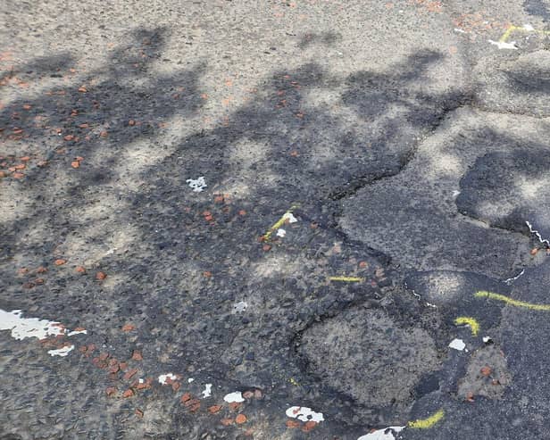 Aileach Road potholes.