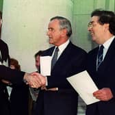 Gerry Adams, Albert Reynolds and John Hume.