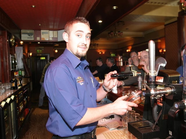 Serving drinks at The Clarendon Bar in 2004.