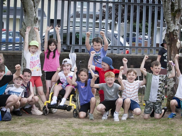 High Fives from Amelie and all her P4 class during the Greenhaw PS Sports Day.