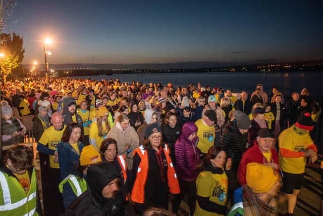 Thousands walk, swim, bike and hike from Darkness into Light as the annual suicide services fundraiser returns 
Saturday May 7th: Starting in the darkest hours of this morning at 4.15am, walkers started out at 16 venues across Northern Ireland to greet the sunrise as Darkness Into Light returned.  

This year the hybrid nature of the event meant that not only were people walking to raise vital funds for suicide prevention and bereavement services in their area, but many were swimming, hiking, biking or running, or indeed, simply watching the day dawn. In doing so they supported the work of charities in their local area and played their part in shining a light on the issue of suicide.

All of those who participated are part of global community which sees Darkness Into Light, organised by Pieta proudly supported by Electric Ireland, take place in 17 countries across 5 continents, offering support and solidarity to those who have been impacted by suicide and symbolising a journey from despair to hope.

Pictured at the event in Derry are some of the hundreds of people who took part