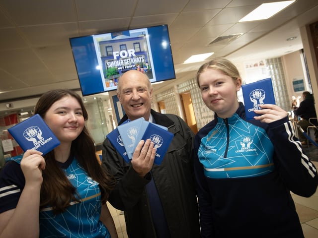 Derry Credit Union member Billy McClay pictured with Youth Committee members Sara Lindsay and Rionach Barr on Saturday. : .