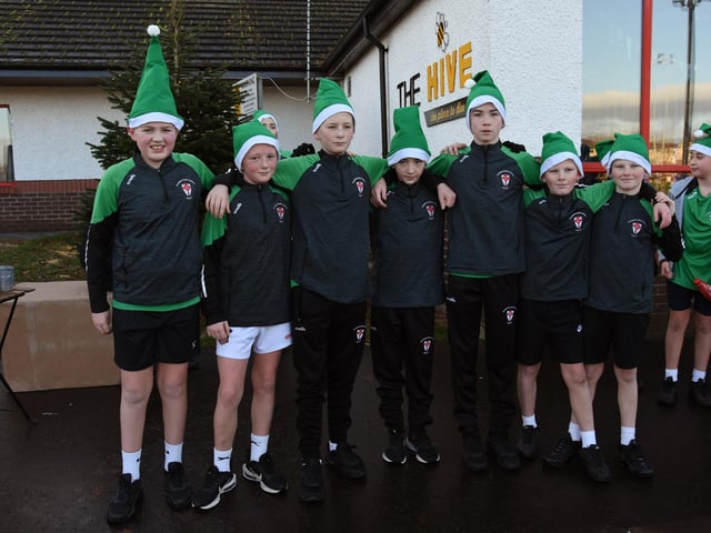 St. Joseph's Boys School students who took part in Tuesday's Manchester United Foundation's Santa's Run at Magee College. From left, Rory, Jake, Shane, Kayden, Calvin, Brandon, Tiernan and John. (Photos: Jim McCafferty Photography)