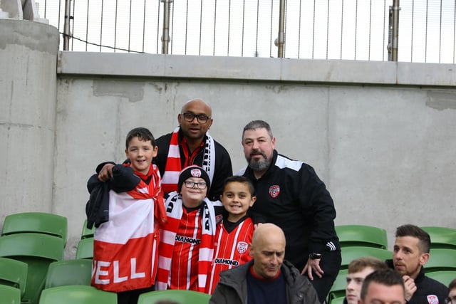 These Derry City fans take the opportunity to pose for our photographer as the atmosphere builds.