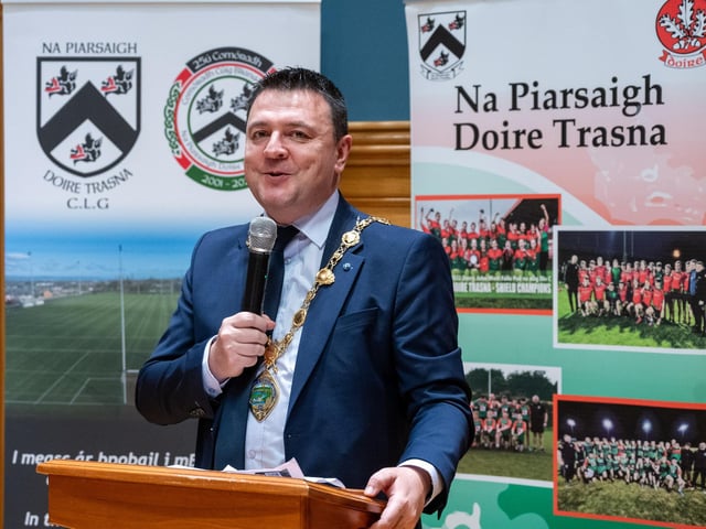 Doire Trasna GAC who are celebrating their 25th Anniversary received a commemorative crystal gift from the Mayor Councillor Ruairi McHugh in the Guildhall to mark their outstanding contribution to sport, community life and promotion of Gaelic games. During the evening the club’s traditional band and Irish dancers entertained guest with performances. Picture Martin McKeown. 22.01.26