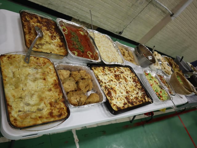 Families brought their own dishes to share during the Eid al-Adha celebrations.