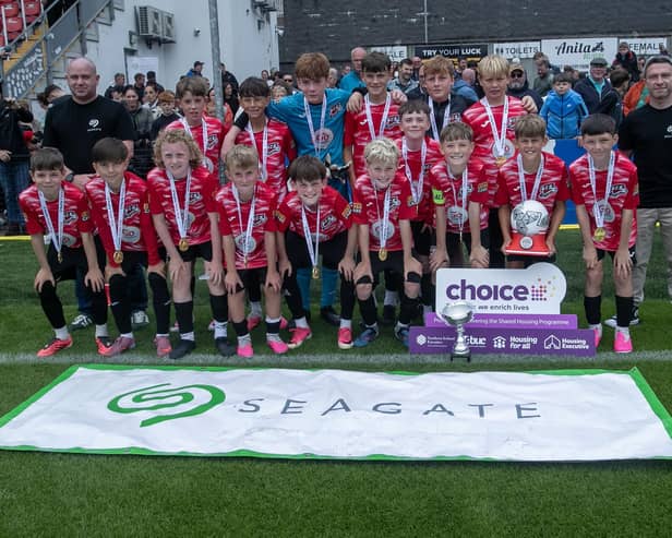 FOYLE CUP 2026 U-12 CHAMPIONS. . . .Maiden City Academy, winners of the 2026 U12 Foyle Cup pictured with Corey Walsh and Declan Travers, Seagate, sponsors. (Photos: Jim McCafferty Photography)