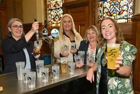 Mayor pictured with Alison Fleming, Visitor Services Manager,  Julie Hannaway, Waste and Recycling Officer and Yvonne Lecky, waste management,  promoting the new reusable cups at the Guildhall.
