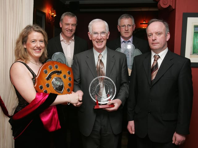 Deputy Cecilia Keaveney, TD, presenting the Hall of Fame Award to George Doherty. Included, from left, are Eamon Ryan, Louis Walsh, joint winners Clubman of the Year, and Mick Murphy, County Games Coaching manager. (2102C45) : Malin GAA Dinner