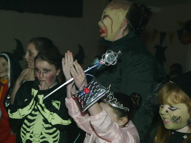 Young people boogying at a Halloween Disco in 2003