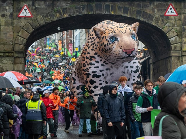 The annual St. Patrick’s Day Spring Carnival took to the streets of Derry on Tuesday as the annual celebration brought entertainers into the city centre before a parade watched by thousands made its way down Shipquay Street past the historic Guildhall. Picture Martin McKeown. 17.03.26