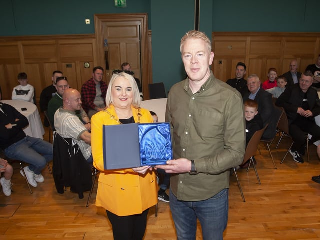 ST. JOSEPH’S ABC 30TH. . . .The Mayor of Derry City and Strabane District Council, Sandra Duffy makes a special presentation to Cahir Duffy, St. Joseph’s Boxing Club to mark the club’s celebration of 30 years in existence, during a reception in the Guildhall on Thursday night last. (Photos: Jim McCafferty Photography)
