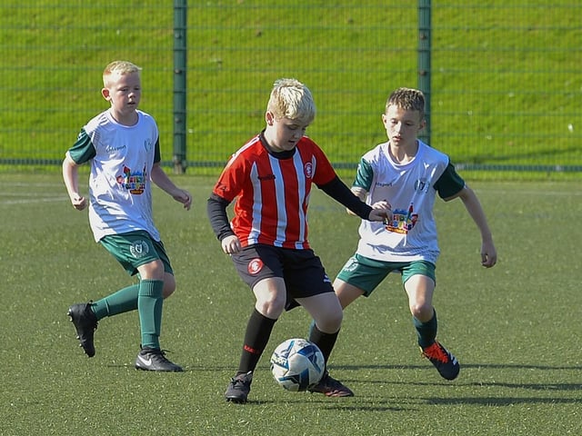 Tristar take on Foyle Harps at the Kian Dawson Kirk Memorial Cup competition held at Leafair. Photo: George Sweeney