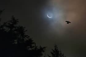 View of a solar eclipse from Killylane Reservoir, Larne, in 2015.