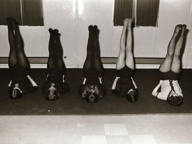 Derry women doing a yoga class at Shantallow Women's Club in Shantallow Community Centre.