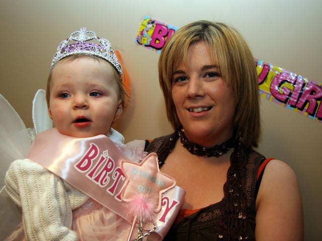 Beth poses for the photographer with her Godmother Michelle 0025JML : Parties and nights out in Derry and Donegal in February 2006.