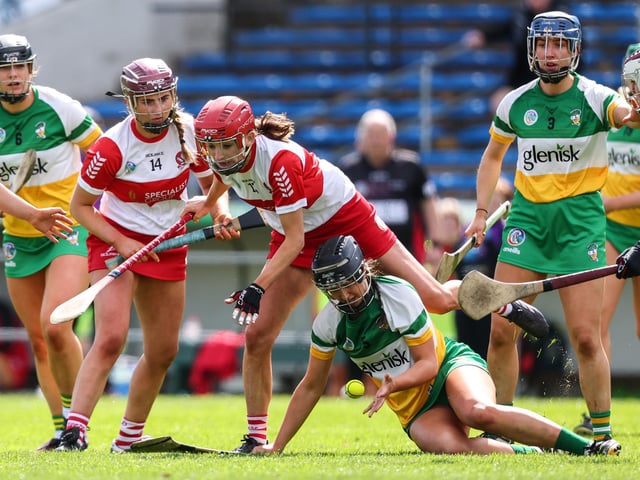 Derry's Jackie Donnelly with Orlagh Phelan of Offaly during the Very Camogie League Division 2A Final at FBD Insurance Semple Stadium in Thurles. (Photo: INPHO/Ben Brady)