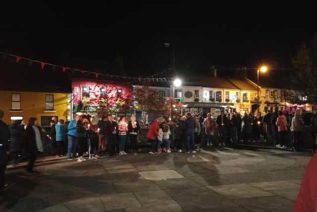 Local people gathered at the prayer vigil for Creeslough in Carndonagh on Saturday.