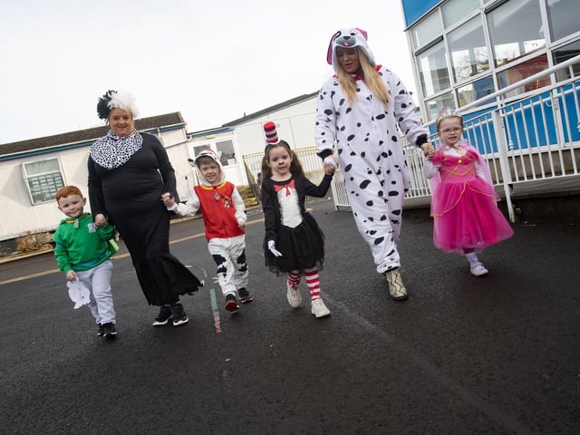 ALL DRESSED UP!. . . .Mrs Feeney and Miss Morrison with pupils Evan, Hailey-Rose and Phoebe on Friday last celebrating World Book Day.