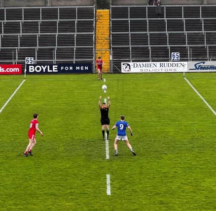 Derry captain Michael Higgins prepares for throw-in at the Ulster Minor Championship tie in Breffni Park.