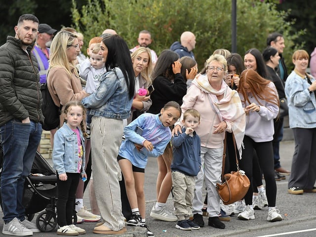 Spectators at the Muff Feile opening parade makes on Friday evening. Photo: George Sweeney