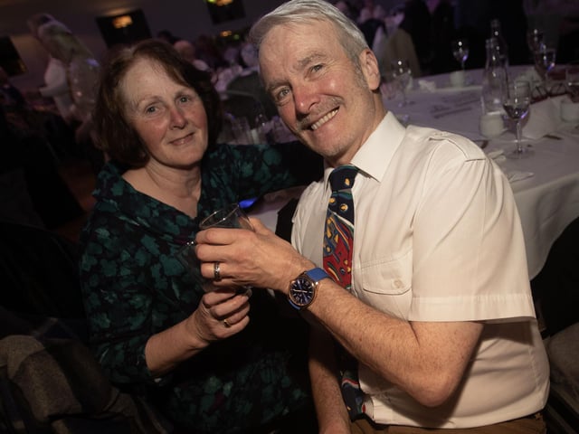 This happy couple enjoying the night's entertainment.