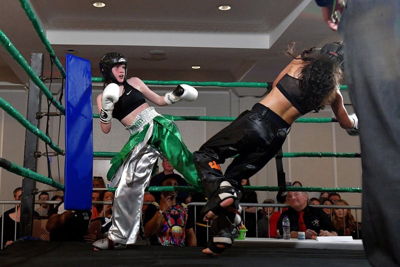 March 2023: Top Ring Gym’s Annie Murphy (left) fighting Baltoufa Manel, Tek Gym France, in the WKU Pro-Am World Title bout at the Everglades Hotel. Photo: George Sweeney