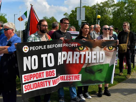 Some of the people who gathered at Free Derry Wall, on Saturday afternoon, to remember ‘The Nakba’, also known as the ‘Palestinian Catastrophe’,  - the destruction of Palestinian society and homeland in 1948. Photo: George Sweeney.  DER2319GS – 25 