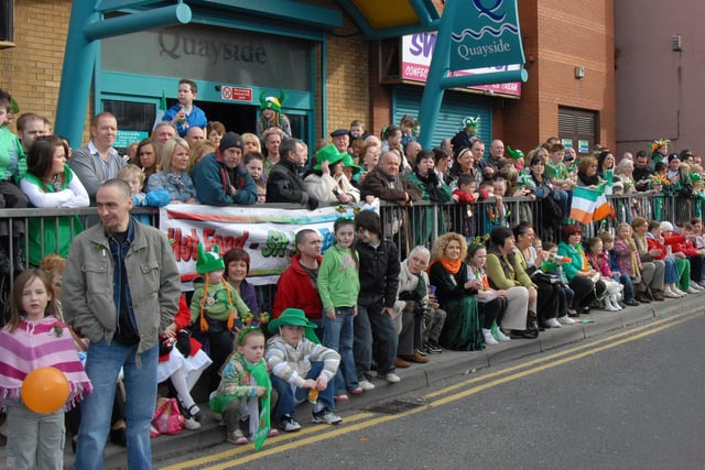 Both the streets and the kerbs were lined with people cheering on the parade in Derry on St Patrick's Day. 1703Ap14
