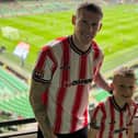 James McClean pictured with his son Junior at the Aviva Stadium supporting Derry City in the FAI Cup Final.